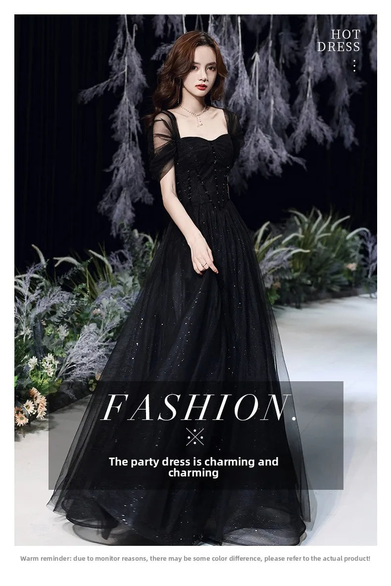 Black evening dress for women by MC THE BLACK DIAMOND, elegant dress with a fitted silhouette and stylish design.