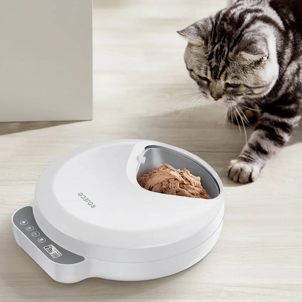 Wireless automatic pet feeder for cats and dogs by MC THE BLACK DIAMOND, dispensing wet and dry food with 4 meal capacity.
