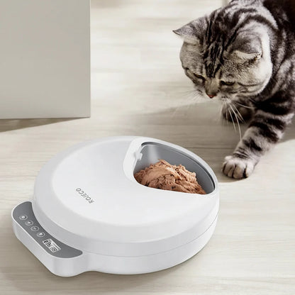 Wireless automatic pet feeder for cats and dogs by MC THE BLACK DIAMOND, dispensing wet and dry food with 4 meal capacity.