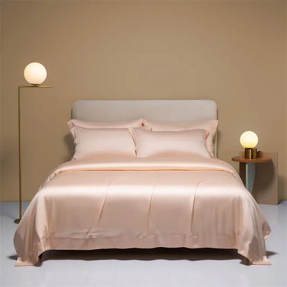 Natural mulberry silk duvet cover in solid color, shown on a bed, from 𝕄𝕮 𝕋𝕙𝕖 𝔹𝕝𝕒𝕔𝕜 𝔻𝕚𝕒�