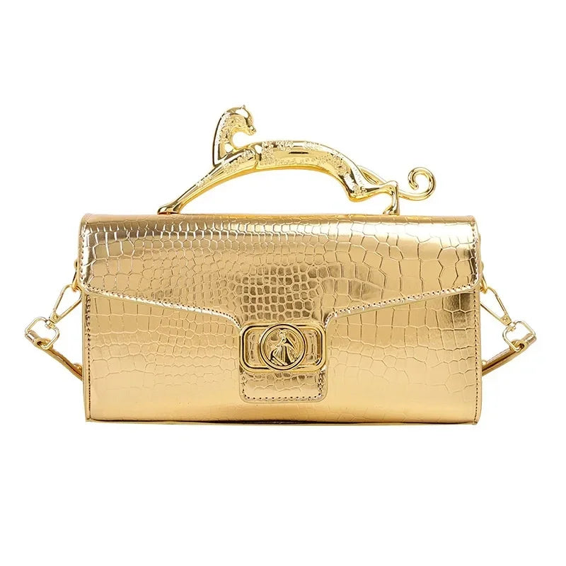 Women’s luxury leather shoulder bag by MC THE BLACK DIAMOND with metal buckle, simple design, perfect for parties and fashionable occasions.