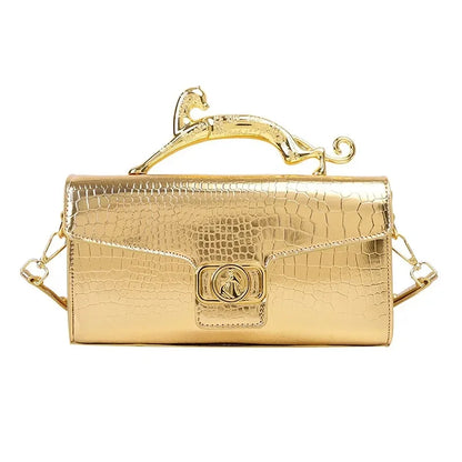 Women’s luxury leather shoulder bag by MC THE BLACK DIAMOND with metal buckle, simple design, perfect for parties and fashionable occasions.