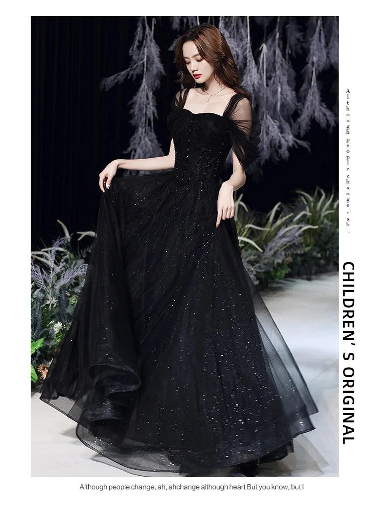 Elegant black evening dress for women by MC THE BLACK DIAMOND, featuring a sleek, stylish design perfect for formal occasions.