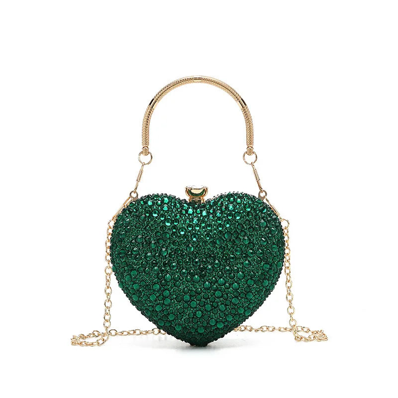 Luxury diamond inlay heart-shaped crystal clutch purse by MC THE BLACK DIAMOND, evening wedding party shoulder bag with rhinestone embellishments.
