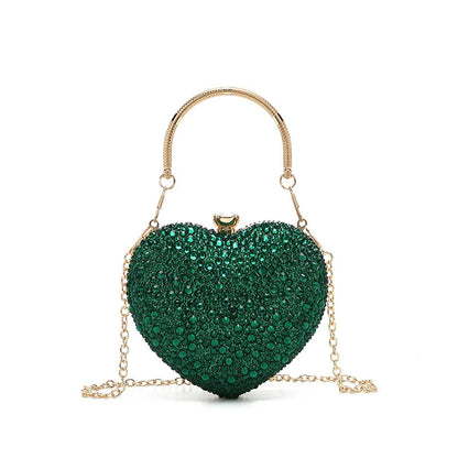 Luxury diamond inlay heart-shaped crystal clutch purse by MC THE BLACK DIAMOND, evening wedding party shoulder bag with rhinestone embellishments.