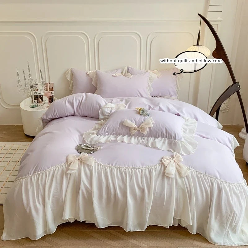 White bedding set with ruffles duvet cover by MC The Black Diamonds, featuring a soft bedsheets and elegant design.