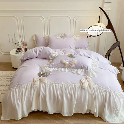 White bedding set with ruffles duvet cover by MC The Black Diamonds, featuring a soft bedsheets and elegant design.