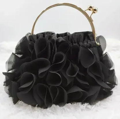 Luxury satin floral bride clutch bag by MC THE BLACK DIAMOND, featuring a small shoulder chain and elegant floral design.