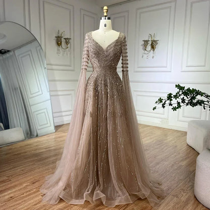 Elegant Arabic caramel dress by MC THE BLACK DIAMOND, featuring intricate design and flowing fabric, perfect for special occasions.