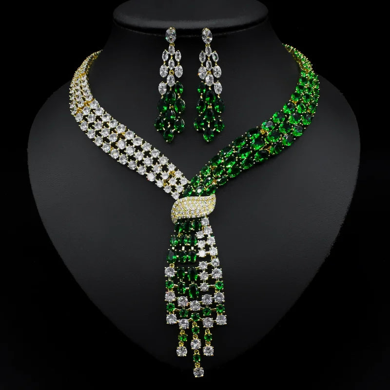 Handmade Lab Emerald and Diamond jewelry set including wedding rings, earrings, and necklace in 14K white gold for women and bridal.