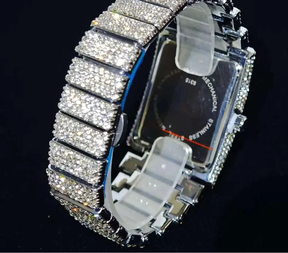 Luxury gold ice watch by MC THE BLACK DIAMOND featuring a diamond-studded rectangle quartz design for men.
