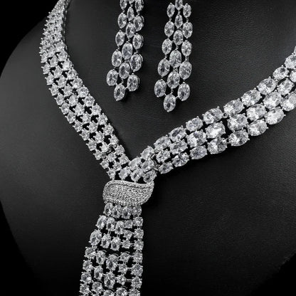 Handmade lab emerald and diamond jewelry set with 14K white gold wedding rings, earrings, and necklace for women bridal engagement