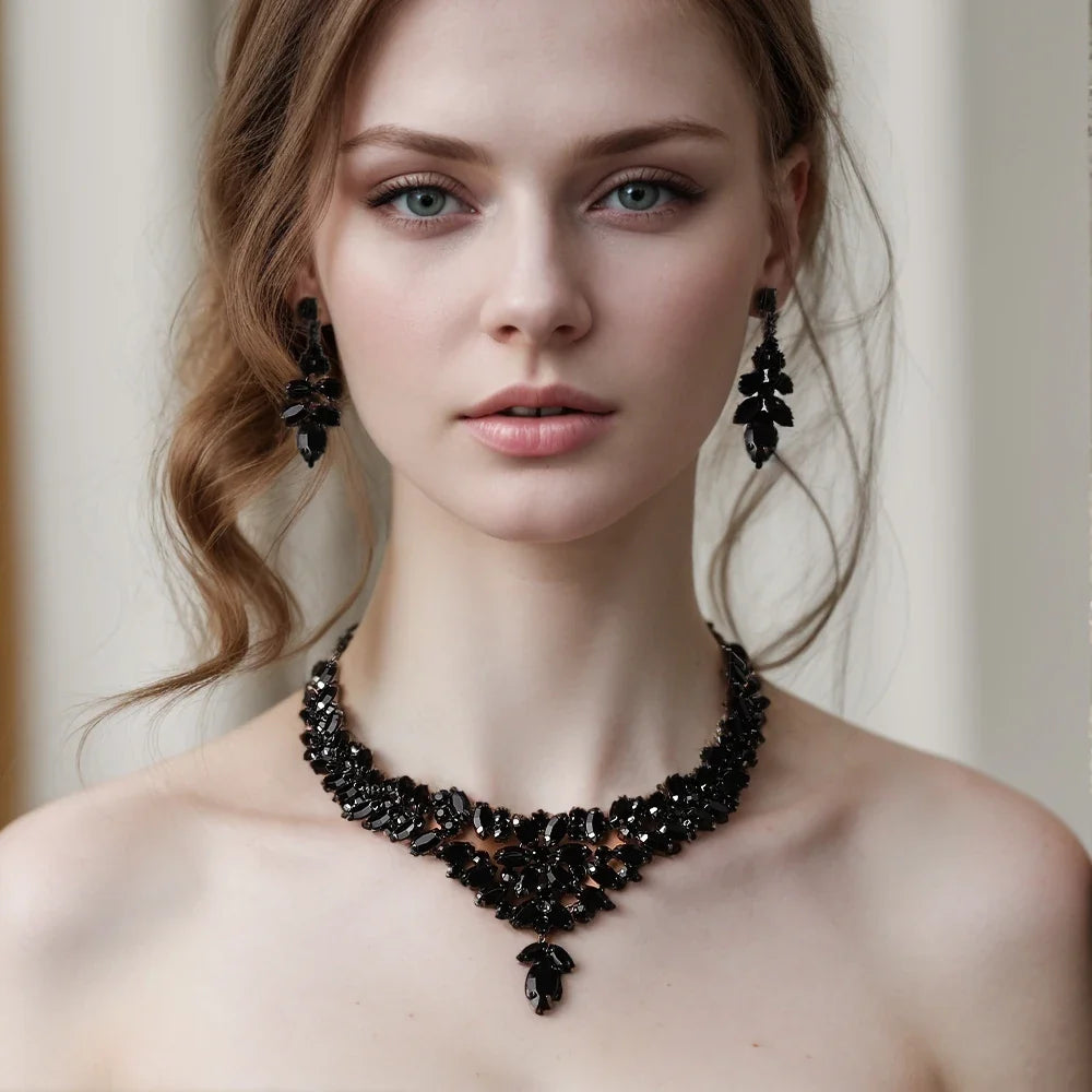 Elegant black leaves jewelry set by MC THE BLACK DIAMOND with crystal rhinestone necklace and earrings for bridal or boho wedding look.