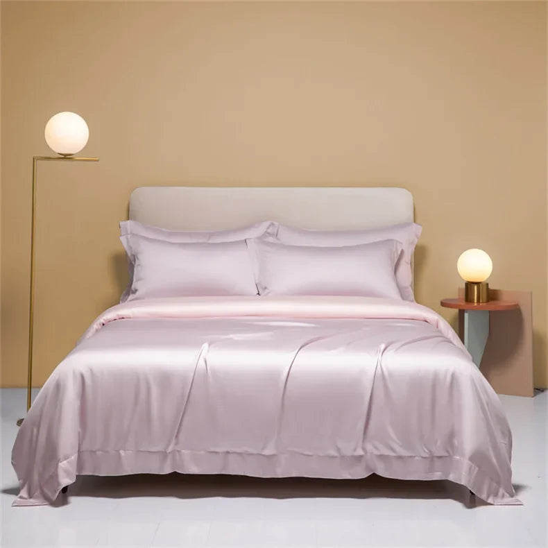 Elegant natural mulberry silk duvet cover in solid color, shown on a bed with a smooth, luxurious texture in a single size.