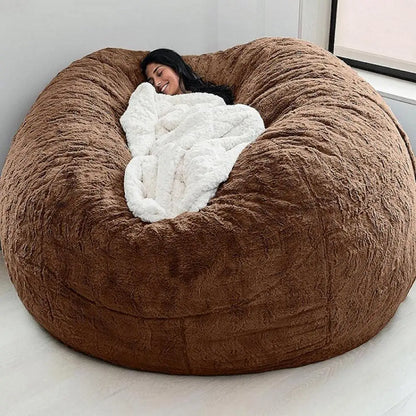 MC THE BLACK DIAMOND oversized bean bag chair cover, black fabric with visible seams and a zipper closure for easy fitting.