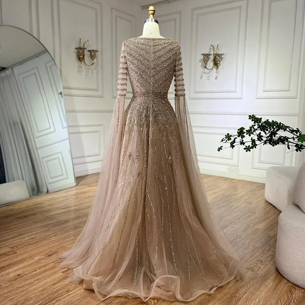 MC THE BLACK DIAMOND Arabic Caramel Elegant Dress featuring intricate embroidery and flowing fabric for sophisticated style.