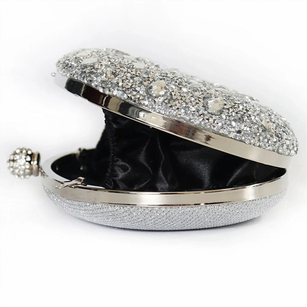 Luxury diamond clutch evening bag by MC THE BLACK DIAMOND, featuring elegant design and sparkling embellishments.