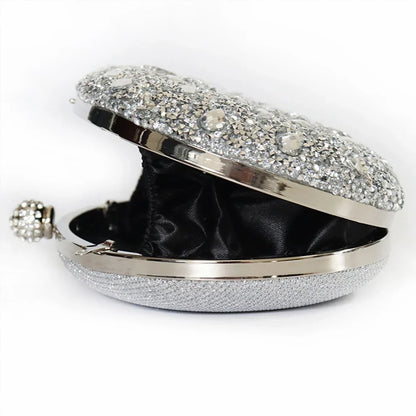 Luxury diamond clutch evening bag by MC THE BLACK DIAMOND, featuring elegant design and sparkling embellishments.