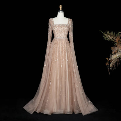Elegant pink Dubai evening dress by MC THE BLACK DIAMOND featuring intricate design and luxurious fabric.
