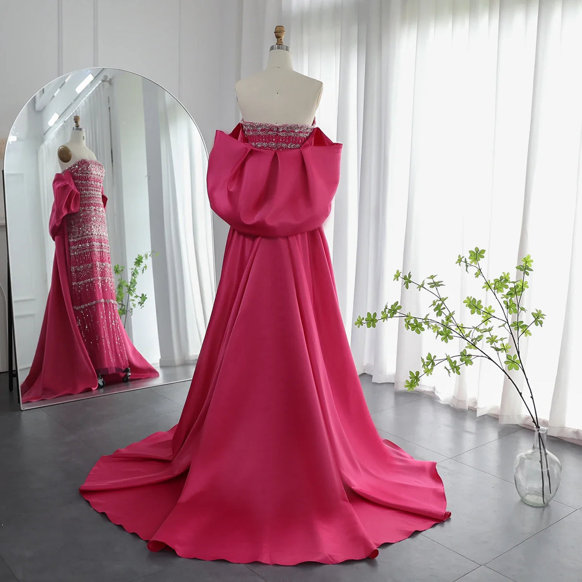 Sage green MC Luxury Dubai evening dress by MC THE BLACK DIAMOND, featuring elegant fabric and sophisticated design.