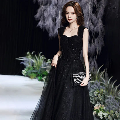 Black evening dress for women by MC THE BLACK DIAMOND, elegant dress with a fitted silhouette and stylish design.