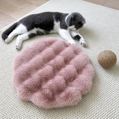 Round washable cat and dog pillow bed with non-slip bottom, insulated pet cushion pad for comfortable sleeping.