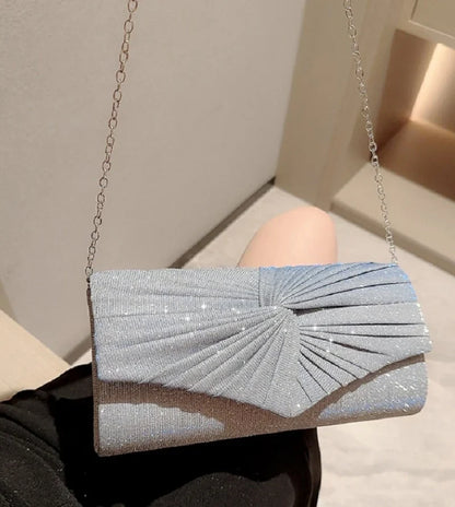Luxury silver ladies dinner handbag from Mohammad Collection featuring shining evening clutch style with crossbody strap.