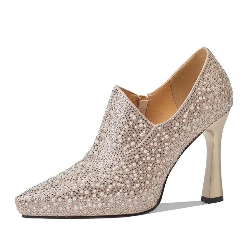 Luxury rhinestone high heels by Mohammad Collection with pointed toes, pearls, crystals, and champagne color for bride or special occasions.