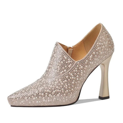Luxury rhinestone high heels by Mohammad Collection with pointed toes, pearls, crystals, and champagne color for bride or special occasions.