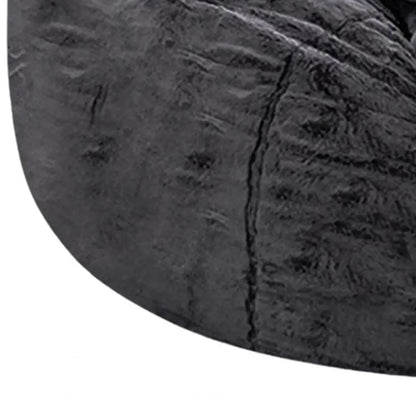 Large MC BRAND oversized bean bag chair cover in black, made by MC THE BLACK DIAMOND, shown in a close-up image.