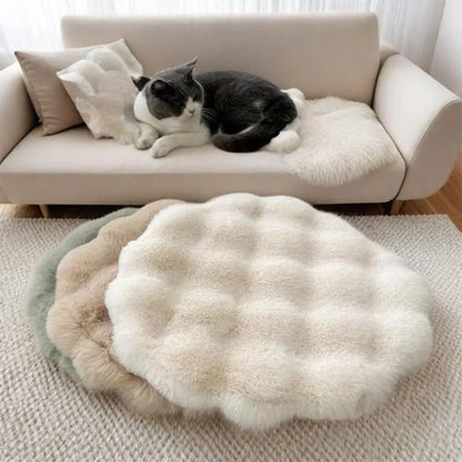 Round washable cat and dog pet cushion bed with non-slip bottom, insulated pillow-style sleeping pad by MC THE BLACK DIAMOND.