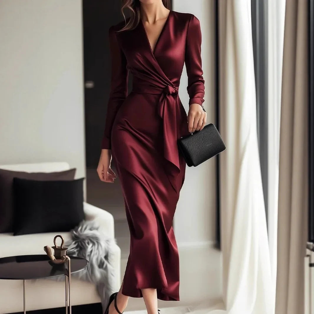 Long sleeve V-neck gown with waist belt and ankle-length hem from 𝕄𝕔 𝕋𝕙𝕖 𝔹𝕝𝕒𝕔𝕜 𝔻𝕚𝕒𝕞�