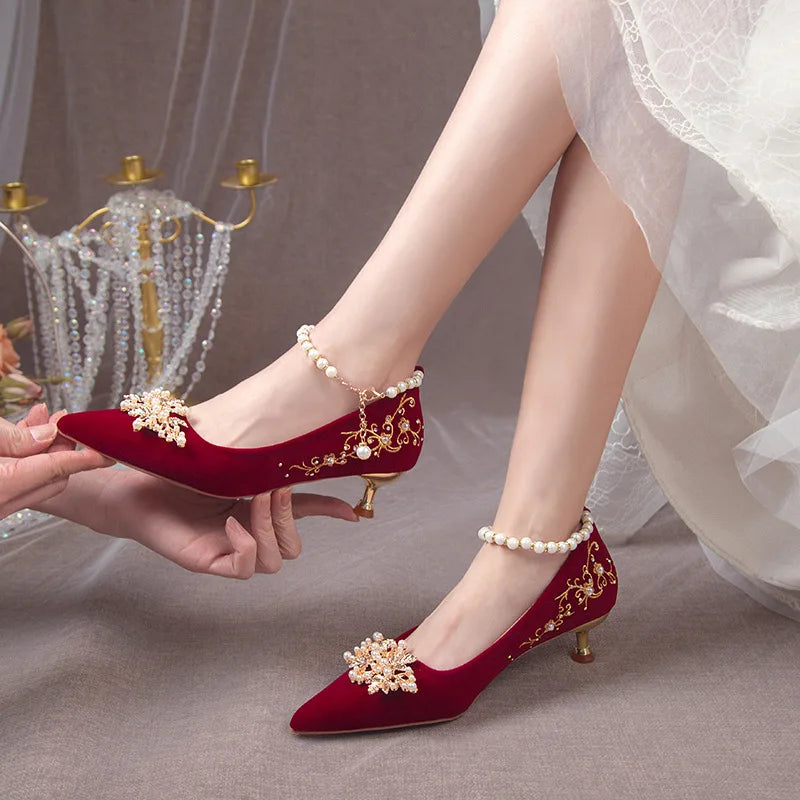 Women’s red high heel shoes by Mohammad Collection with pointed toes, elegant design, water diamond accents, suitable for weddings and banquets.