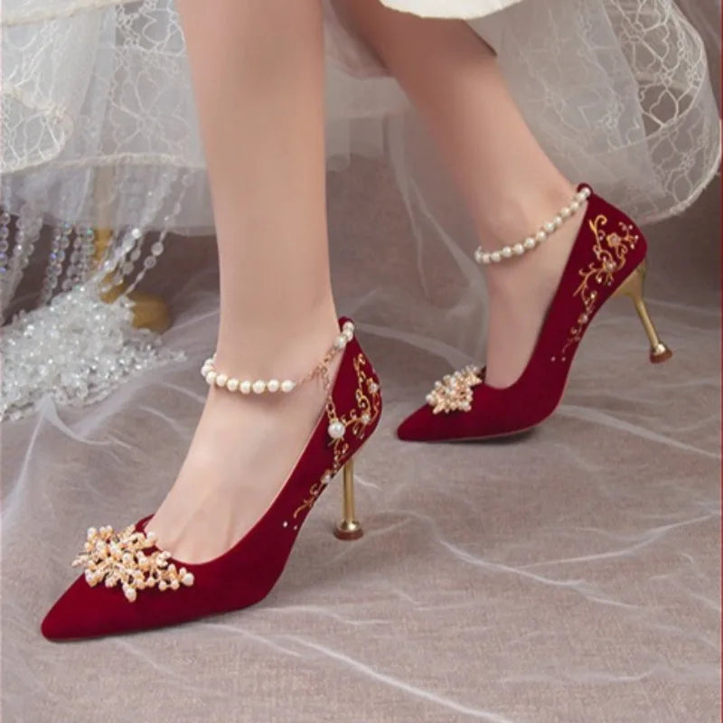 Women’s red high heel shoes by Mohammand Collection featuring pointed toes, elegant design, and sparkling water diamond accents.
