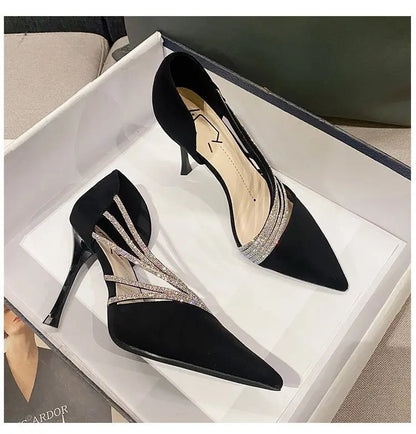 Women’s black high heels from MC The Black Diamonds, elegant pump shoes for evening parties and special occasions.
