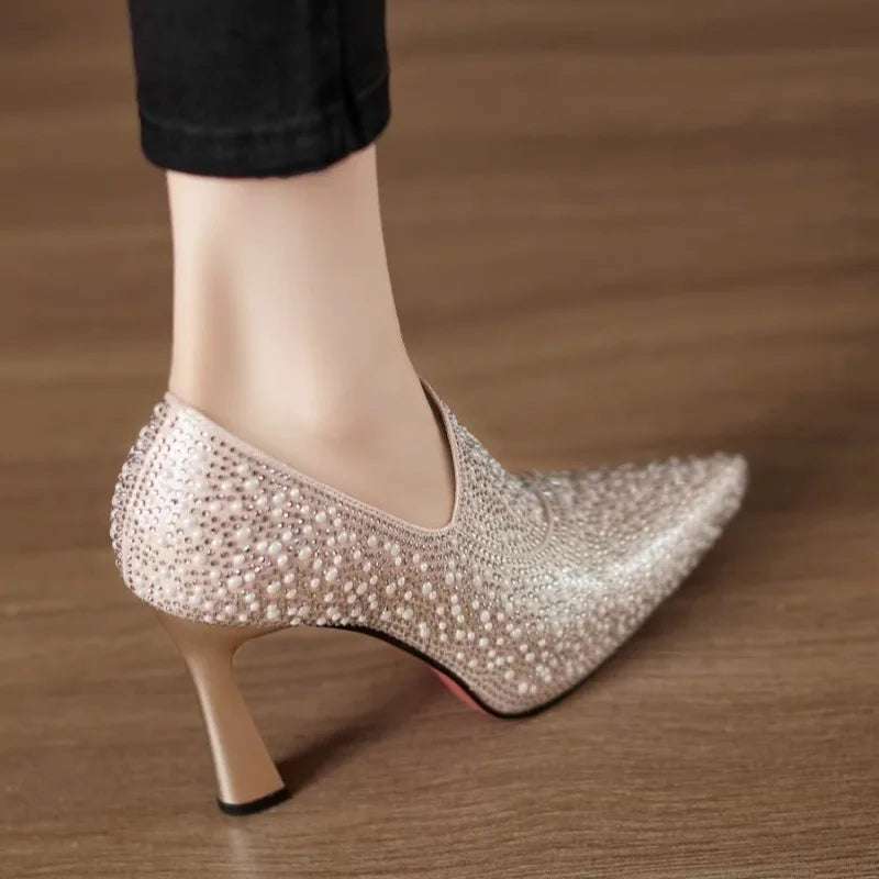 Luxury rhinestone high heels by Mohamad Collection with pointed toes, pearls, and crystals, perfect for weddings and formal occasions.