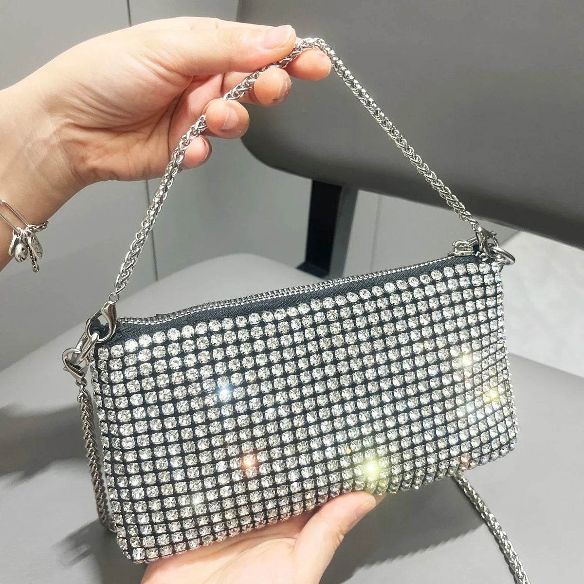 Luxury MC THE BLACK DIAMOND rhinestones clutch purse for women, stylish handle and shoulder bag with sparkling design.