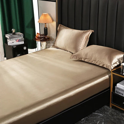 Luxury satin bedding set with fitted sheet and duvet cover by MC THE BLACK DIAMOND, featuring smooth, elegant home decor.