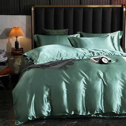 Luxury satin bedding set with fitted sheet and duvet cover in elegant black from MC THE BLACK DIAMOND, perfect for sophisticated bedroom decor.