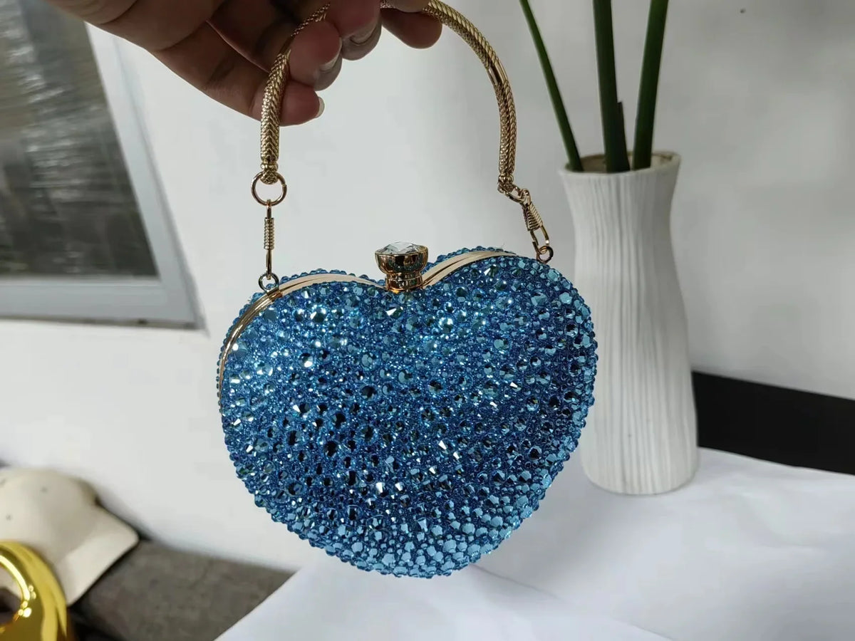 Luxury MC THE BLACK DIAMOND heart-shaped crystal clutch purse with diamond inlay, rhinestones, and a shoulder handle for evening and wedding.