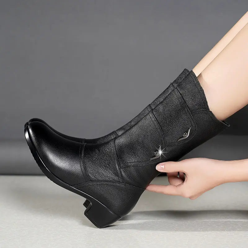 Women’s mid-calf wedge-heeled leather boots by Mohammad Collection, winter shoes with soft leather and stylish design.