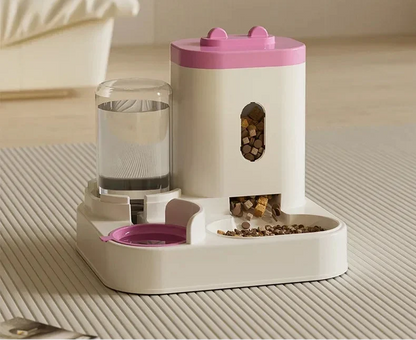 Automatic pet feeder with water fountain from MC THE BLACK DIAMOND, featuring a food bowl and water dispenser for pets.