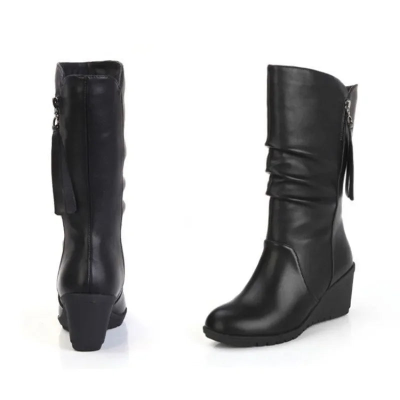 Women’s casual mid-tube Chelsea boots by Mohammad Collection with warm snow-resistant design and stylish ankle fit.