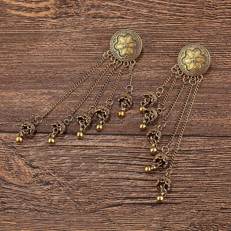 Vintage bohemian bell earrings with tassels, floral design, and Indian-inspired details from 𝕄𝕔 𝕋𝕙𝕖 𝔹𝕝𝕒𝕔𝕜 𝔻𝕚𝕒