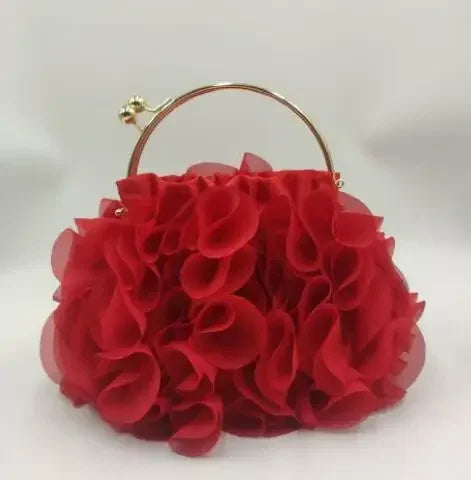 Elegant satin floral bride clutch bag by MC THE BLACK DIAMOND, with a chain strap, perfect for wedding and evening occasions.