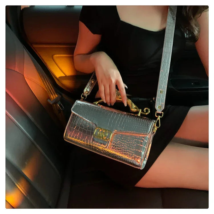 Women luxury leather hand bag by MC THE BLACK DIAMOND with metal buckle, simple fashion shoulder bag for parties and casual wear.
