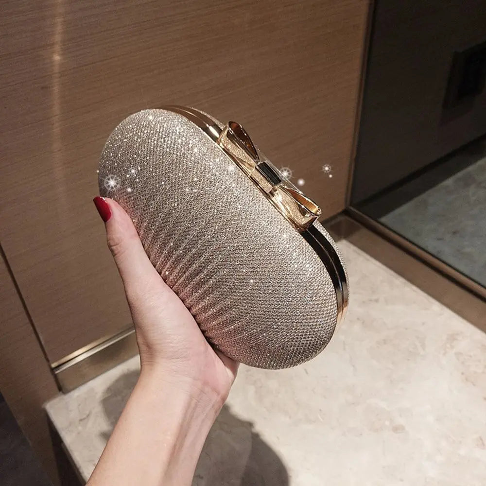Elegant MC THE BLACK DIAMOND wedding bridal clutch handbag for women, featuring a chain strap suitable for evening parties.