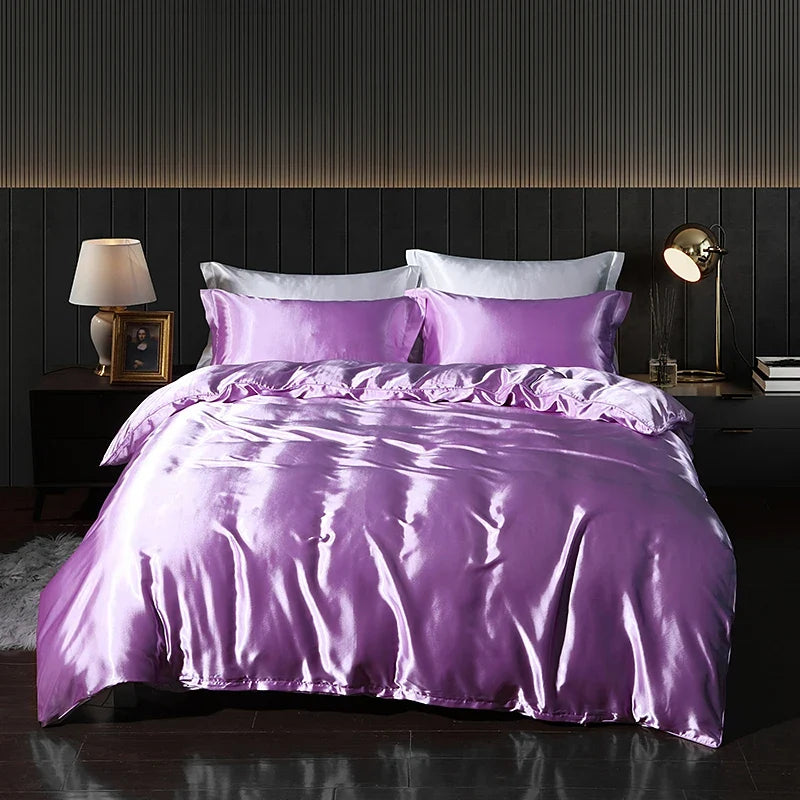 Luxury satin bedding set with fitted sheet and duvet cover by MC THE BLACK DIAMOND, elegant home decor for a stylish bedroom.