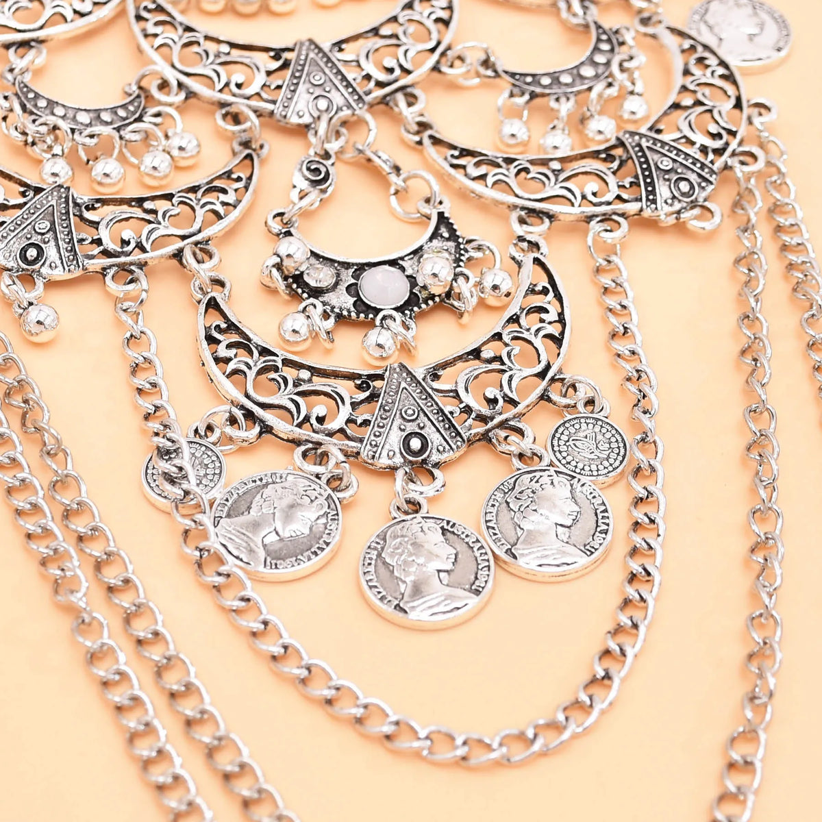 Retro silvery cross chain necklace with moon pendant, traditional gypsy ethnic jewelry, worn with sweaters or dresses.