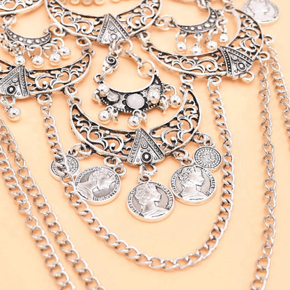 Retro silvery cross chain necklace with moon pendant, traditional gypsy ethnic jewelry, worn with sweaters or dresses.
